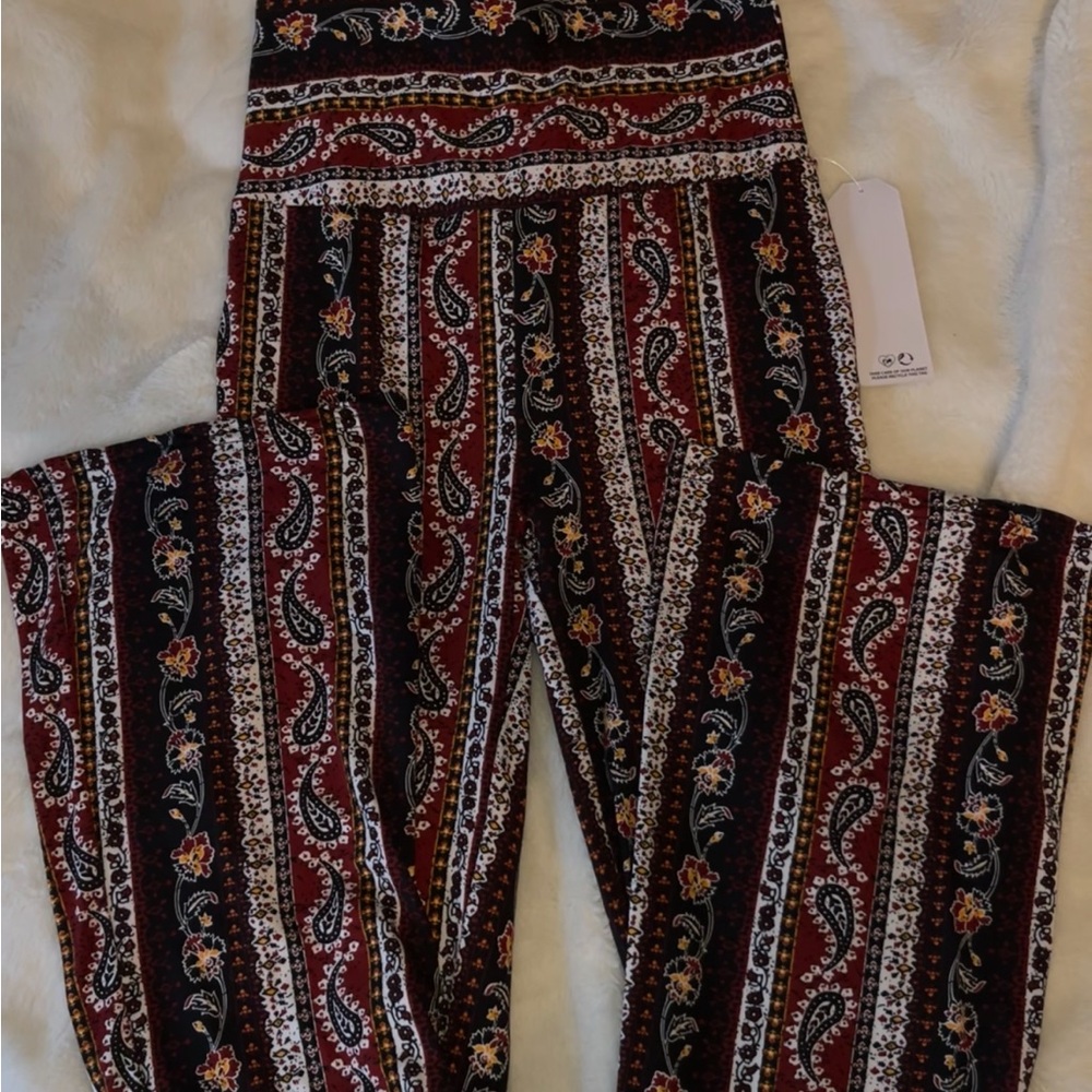 red and black patterned flared leggings